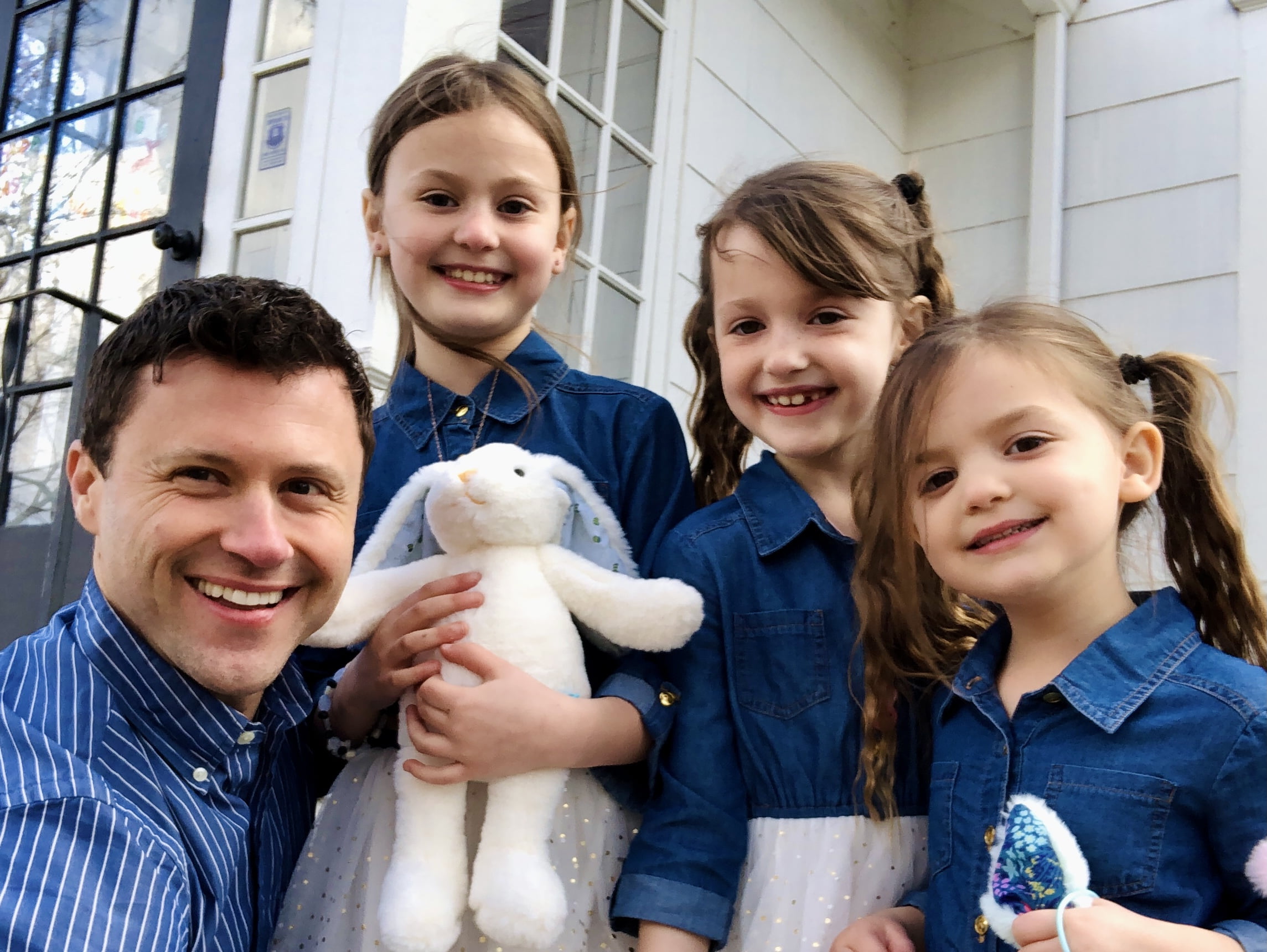 JC Cross with his daughters preparing for church on Easter